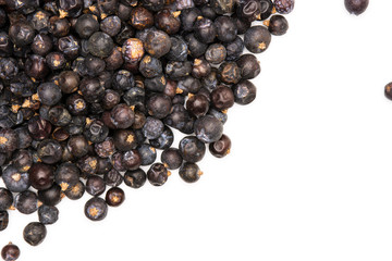Lot of whole dry juniper berry seed flatlay isolated on white background