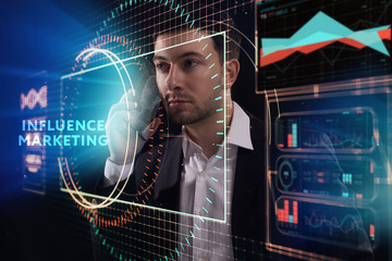 The concept of business, technology, the Internet and the network. A young entrepreneur working on...