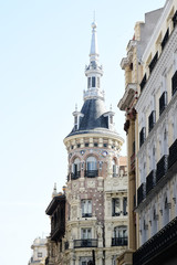 Obraz premium Beautiful buildong of rich architecture in the heart of Madrid, Spain.