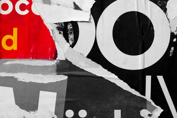 Old grunge ripped torn vintage collage street posters creased crumpled paper surface placard...