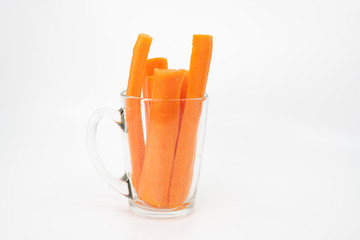 Carrot sticks in a glass container