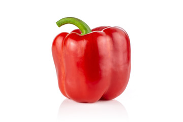 One whole bulgarian red bell pepper isolated on white background