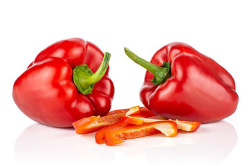 Group of two whole four slices of bulgarian red bell pepper isolated on white background