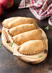 Small Apple pies, traditional patty, Russian food, homemade cakes