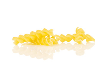 Group of four whole raw italitan yellow pasta torti isolated on white background