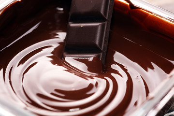 Melting chocolate, melted delicious chocolate for handmade praline icing confectionery