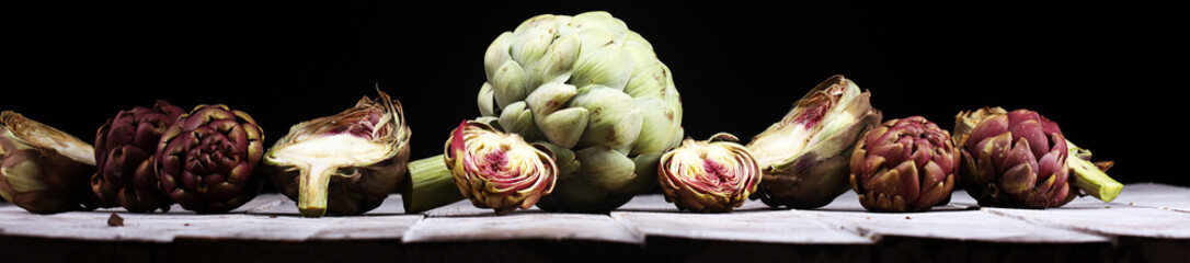 artichokes on grey background. fresh organic artichoke flower vegetable