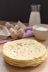 crepes preparation concept with ingredients on tabletop