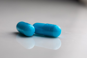 Blue medical pills and capsules pattern