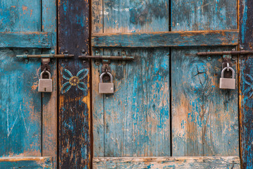 old wooden door with key lock.