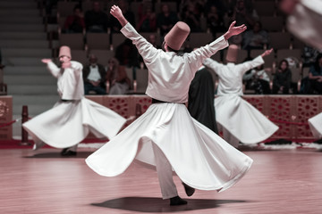 Unidentified whirling Dervishes or Semazen in Konya