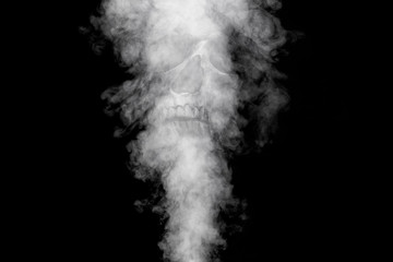 Curls or a column of smoke rising from something unseen against a black background.  Skull appears...