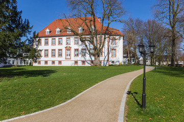 Footpath leading to the Amt Reckenburg building in Wiedenbruck, Germany