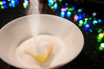 Mixing sugar with butter. Woman is cooking in kitchen, baking a cake or pastry products. Raw, uncooked dough being prepared of eggs, sugar and butter. Delicious, homemade dessert