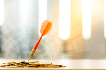 Red arrow embroidery on the coin and double exposure icon technology security on the desk in the...