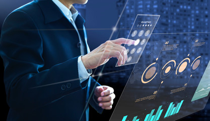 Businessman entering passcode on modern virtual touch screen as an access to investment risk management information and return on investment analysis or business performance. © ktasimar