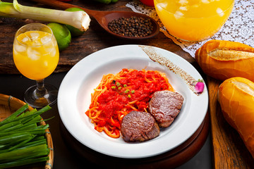 Filet mignon with Bolognese pasta