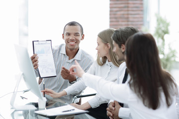 professional business team discussing new information in the office