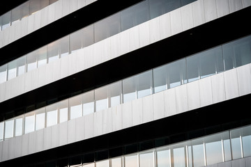 Architectural detail of Modern high corporate building with glass and steel and clean lines