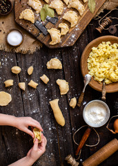 Overhead shot process of making homemade dumplings with potato