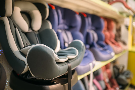 Child Car Seats Variety On Shelf In Store, Nobody