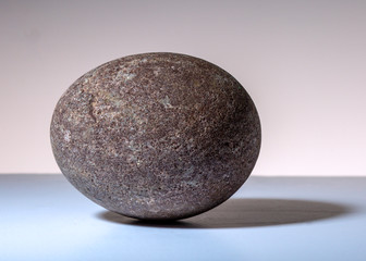 stone on the table, round raw texture 