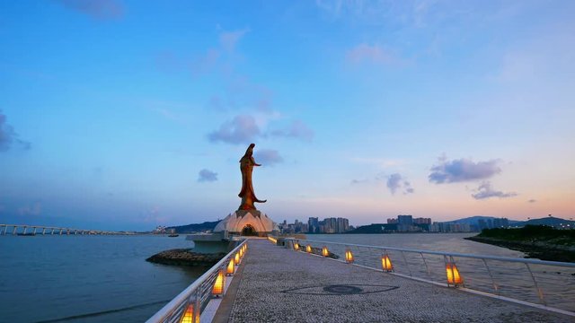 MACAU, CHINA - SEPTEMBER 7, 2018: 4K Time lapse Beautiful Statue Guan Yin or Kun Iam landmark in macau china