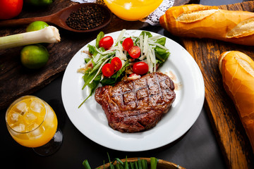 Grilled meat with trimmings