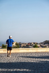  the guy looks at the city