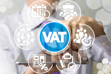 Man uses tablet pc and virtual screen sees the acronym: VAT. VAT Value Added Tax Business Finance...