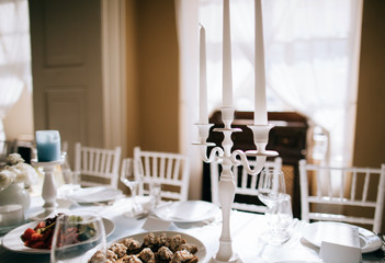 elegant table with candlesticks in a restaurant