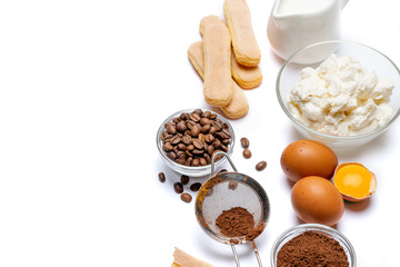 Ingredients for cooking tiramisu - Savoiardi biscuit cookies, mascarpone, cream, sugar, cocoa, coffee and egg