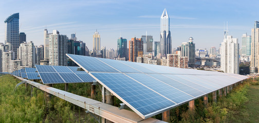 Solar panels and urban construction background