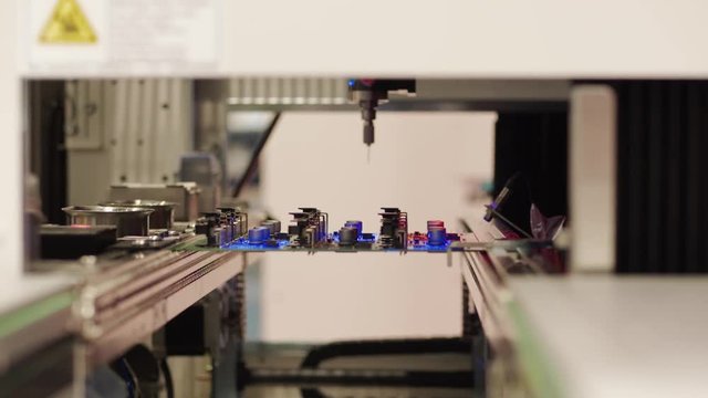 Selective spraying board using automated selective conformal coating by robot system. Flexible robotic method of coat. Application and processing system in manufacturing. Automation production process