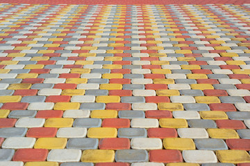 Paving slabs for pedestrian areas. Texture of paving slabs of different colors for the improvement of yards and footpaths