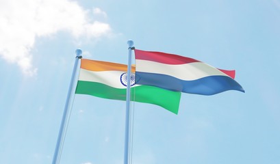 India and Netherlands, two flags waving against blue sky. 3d image