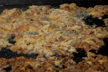 Hoi Tod or Thai Style Crispy Fried Oysters and  Mussel Pancakes , Hot Pan Seafood .