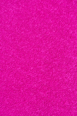 Grungy pink background. Colored material for decoration.