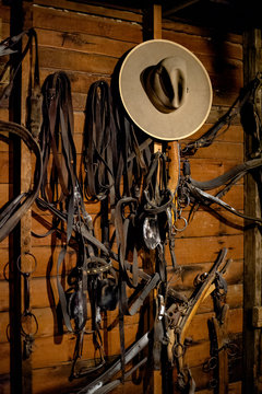 Cowboy Gear Hanging On Wall