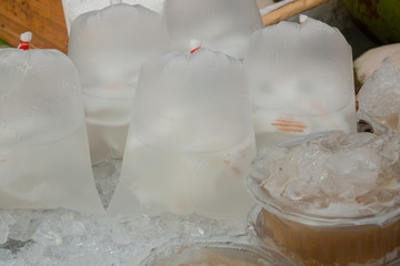 coconut water in bag with ice .
