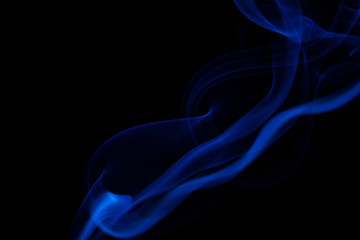 Colorful smoke close-up on a black background