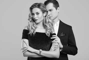 Sensual beautiful young couple dressed in formal clothes