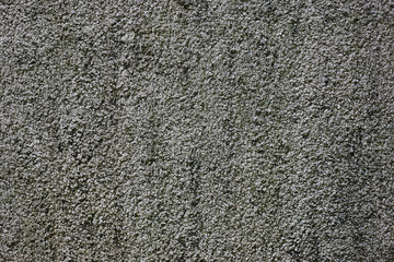 The old concrete wall with moss. Horizontal background
