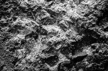 Pitted concrete resembling a mountain range