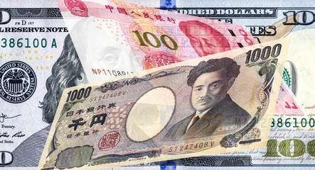 Fototapeta na wymiar Japanese yen banknote, american dollar and chinese yuan