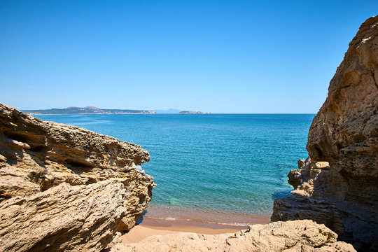 Rocks on the beach of Platja de Pals in a beautiful summer day, Costa Brava, Catalonia, Spain