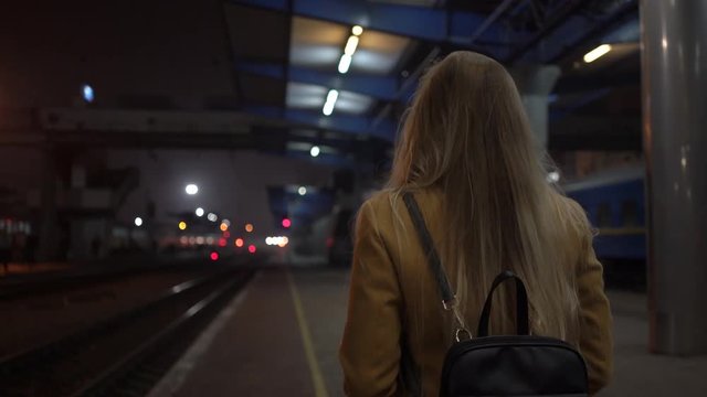 4K Woman At The Train Station Waiting