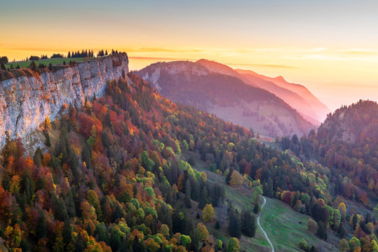 Scenic view of mountain against cloudy sky