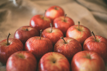 Close up view of red apples as background. Heap of ripe red apples. 