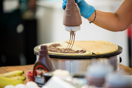 Cheft Preparing Sweet Chocolate Crepe